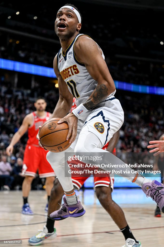 Bruce Brown Of The Denver Nuggets Wrangles A Loose Ball Against The