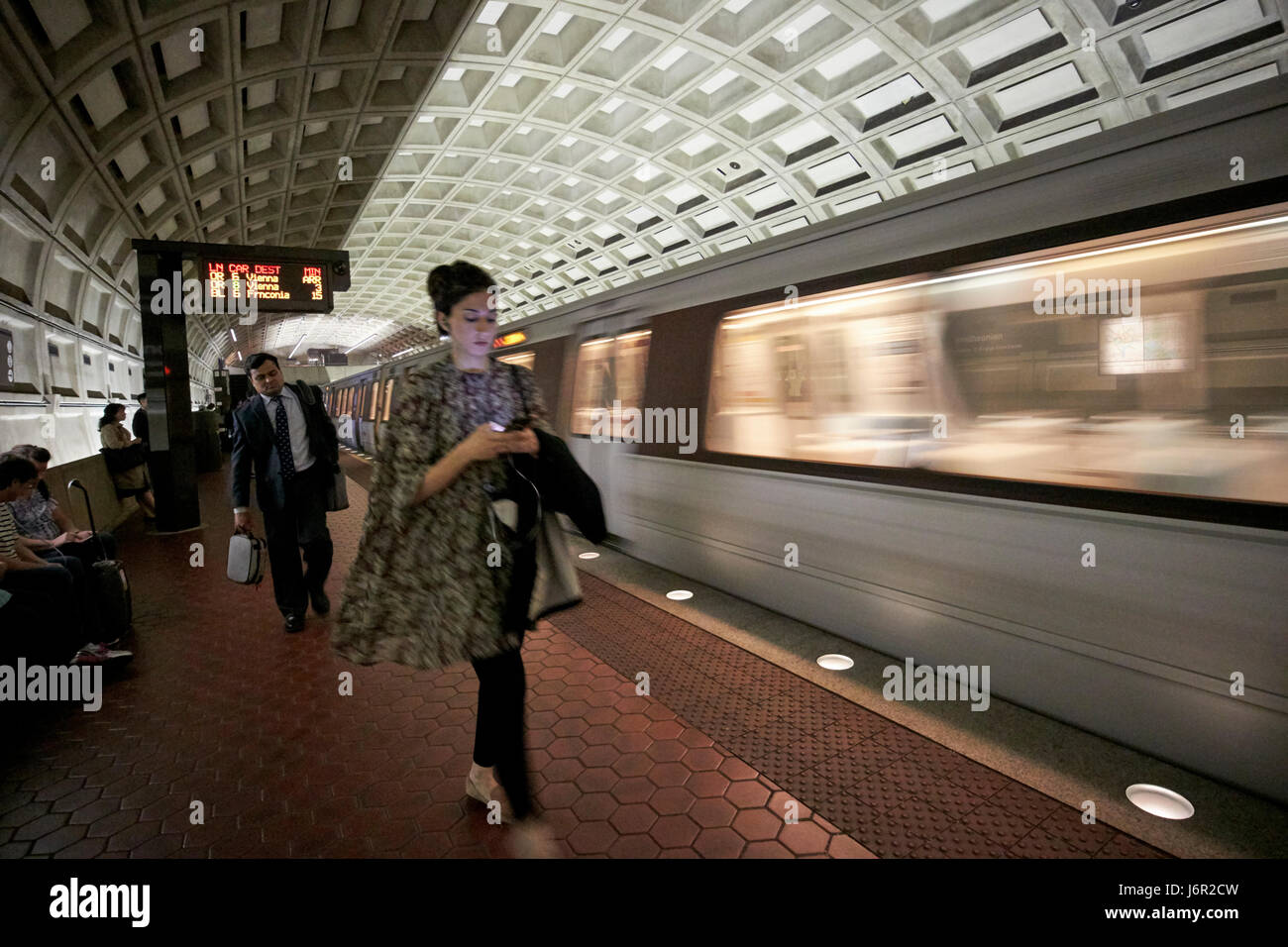 Passengers And Moving Train At Smithsonian Metro Underground Train