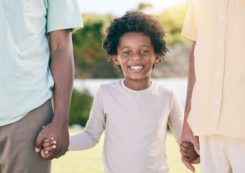 Portrait Of Kid Smile And Holding Hands Of Parents Happy In Backyard